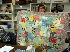 Our newest member Tarra! And the sweet cowboy quilt that she made for her son.