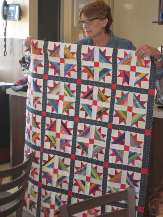 01-Val showing scrap paper piece quilt
